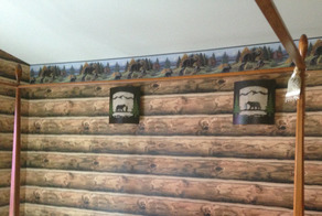 Log wallpaper in bedroom with north woods border