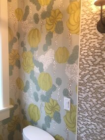 Fabric installed on bathroom wall